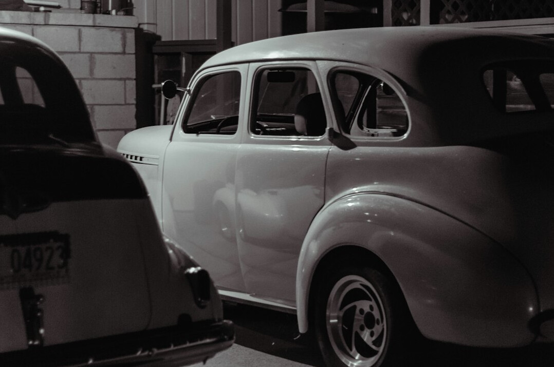 Editorial archive office with vintage automobile photographs, books and film negatives