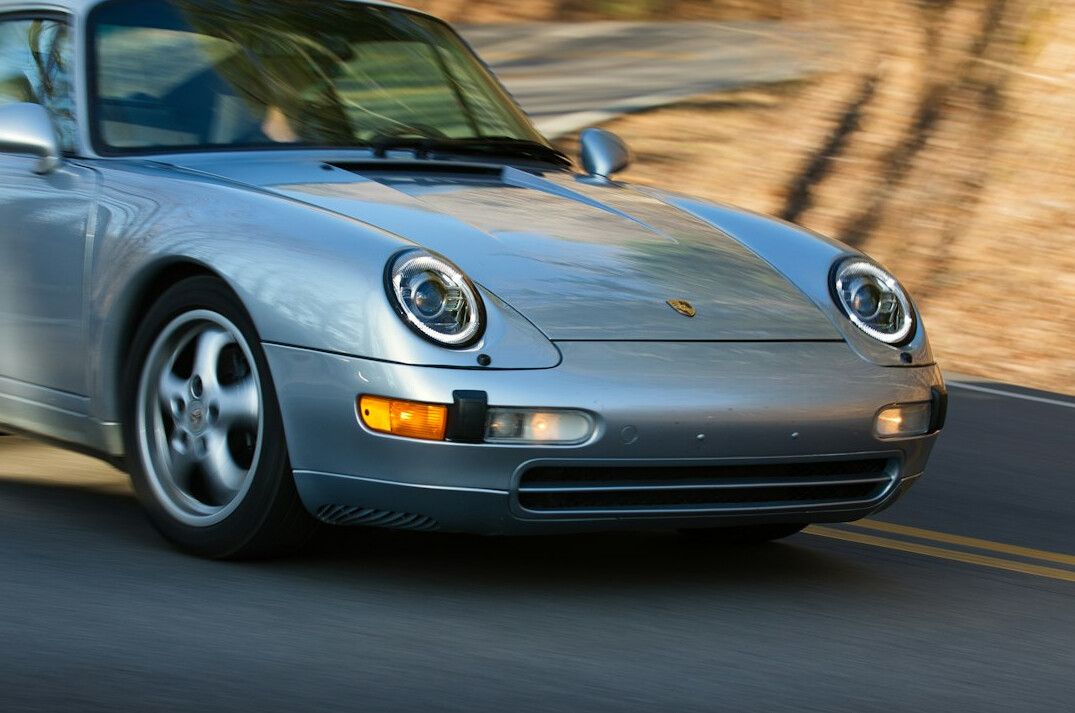 luxury sports car on mountain road